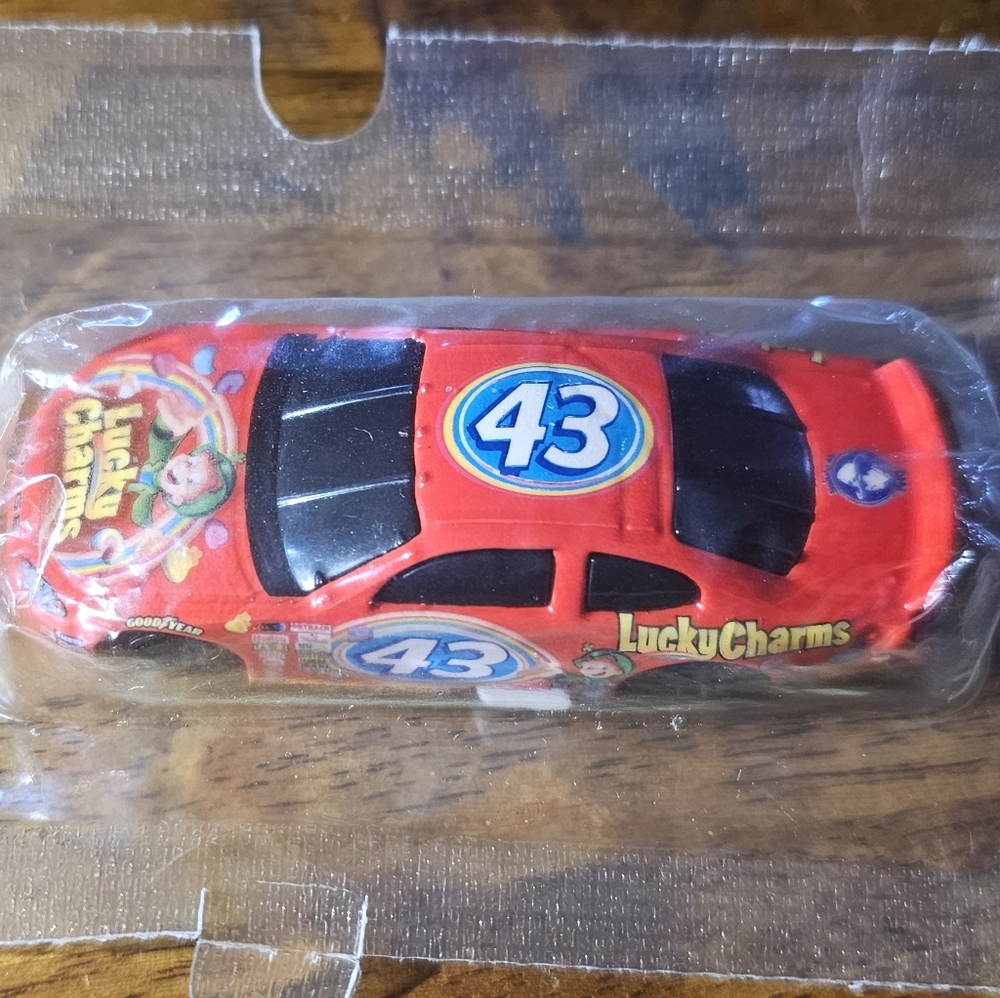 NIP Salute to Petty Lucky Charms 2001 Dodge Intrepid Diecast Collectible 1:64.